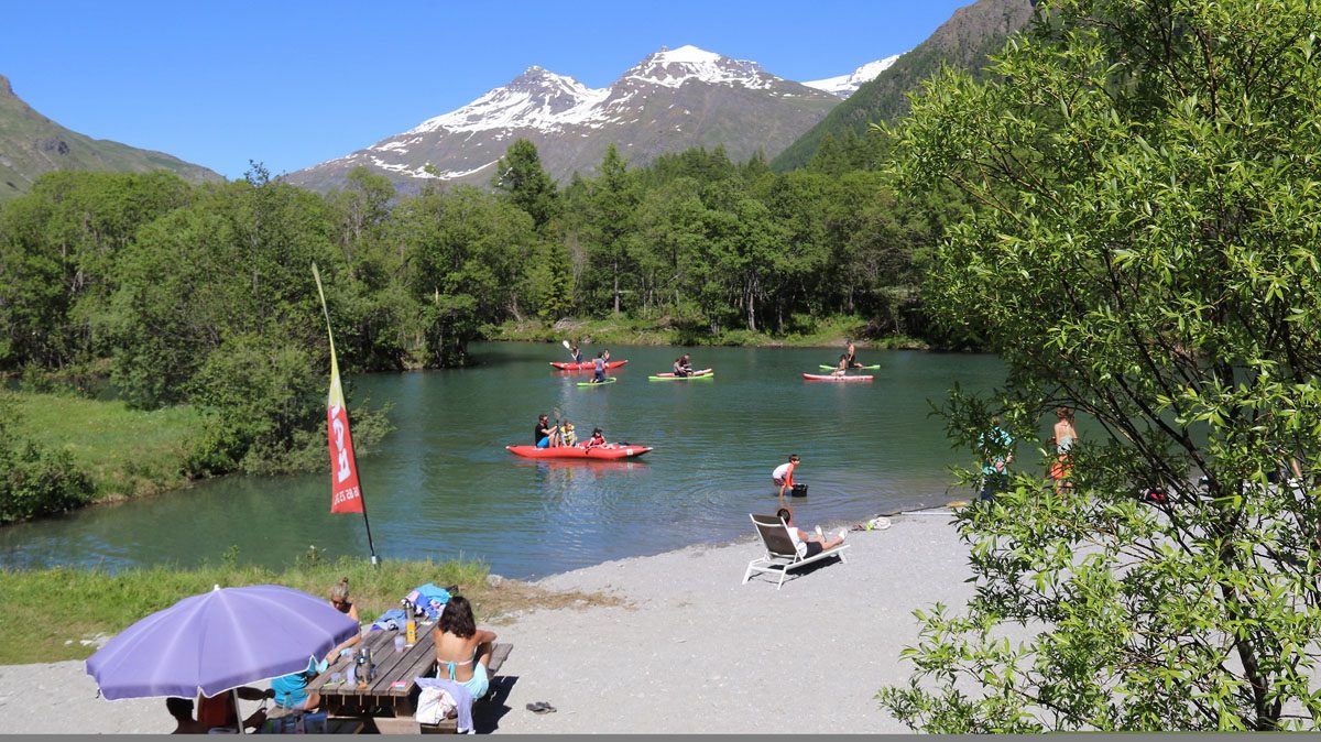 Swimming at the Bessans lake in summer